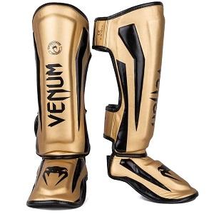 Venum - Espinilleras / Elite / Oro-Negro / Large